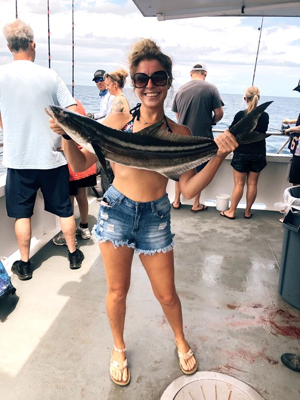 Beginner enjoying a successful fishing day near Daytona Beach with no prior experience